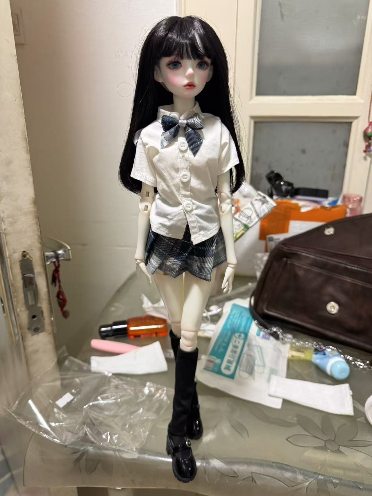 使用手感：娃娃收到啦好漂亮，迫不及待给女儿买了小衣服，关节活动也很灵活，喜欢喜欢，头发质量也好好
